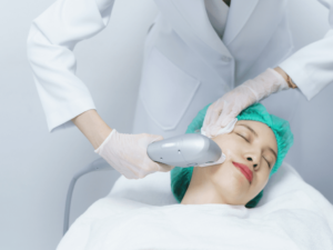 woman on a bed getting hifu treatment for face
